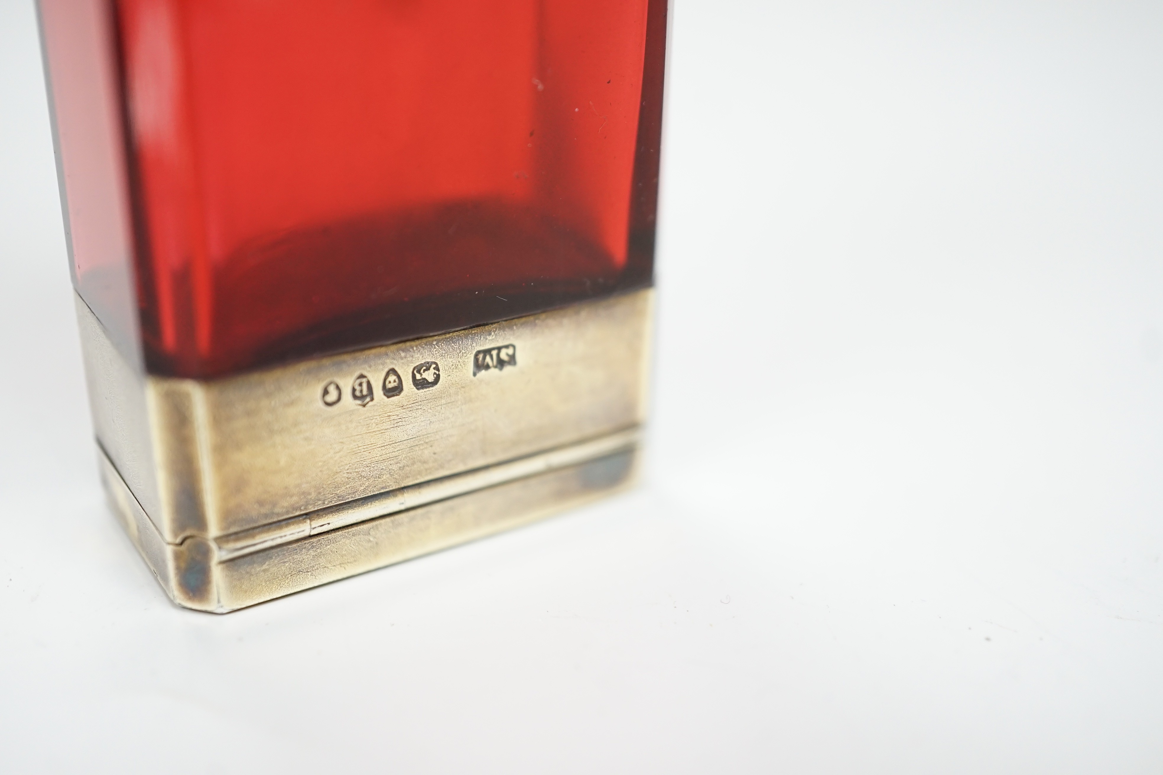 A late Victorian silver gilt mounted ruby glass combination scent bottle/vinaigrette, by Sampson Mordan & Co, London, 1877, 96mm.